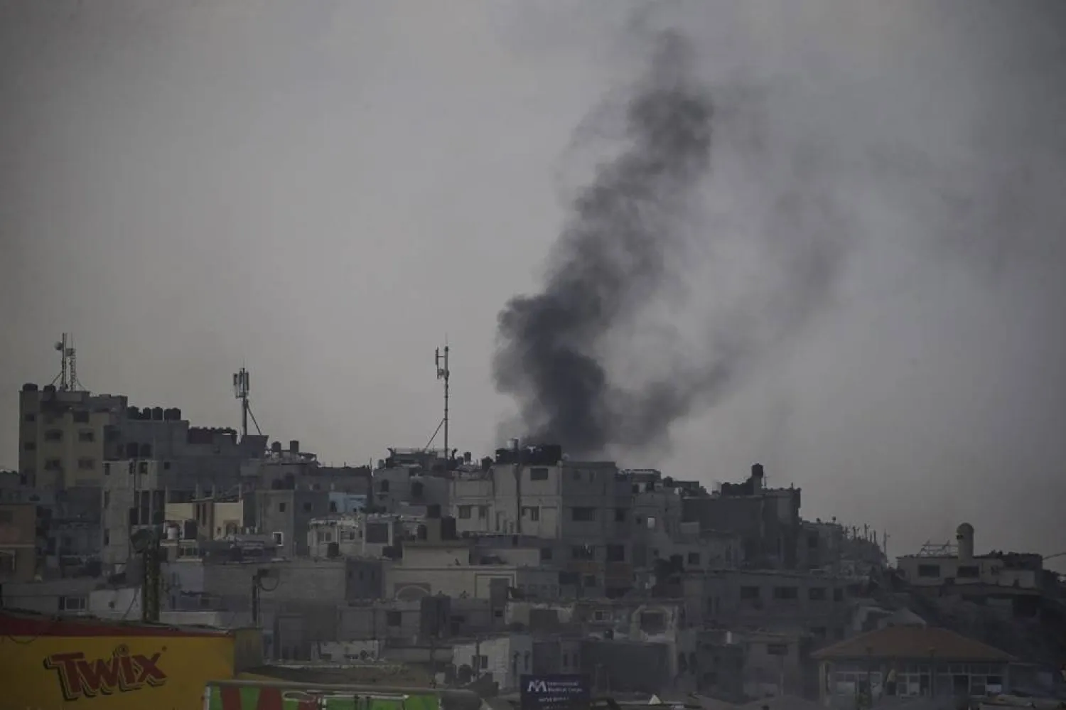 Smoke rises following an Israeli air strike during a military operation in Deir Al-Balah, central Gaza Strip, 28 August 2024. (EPA)