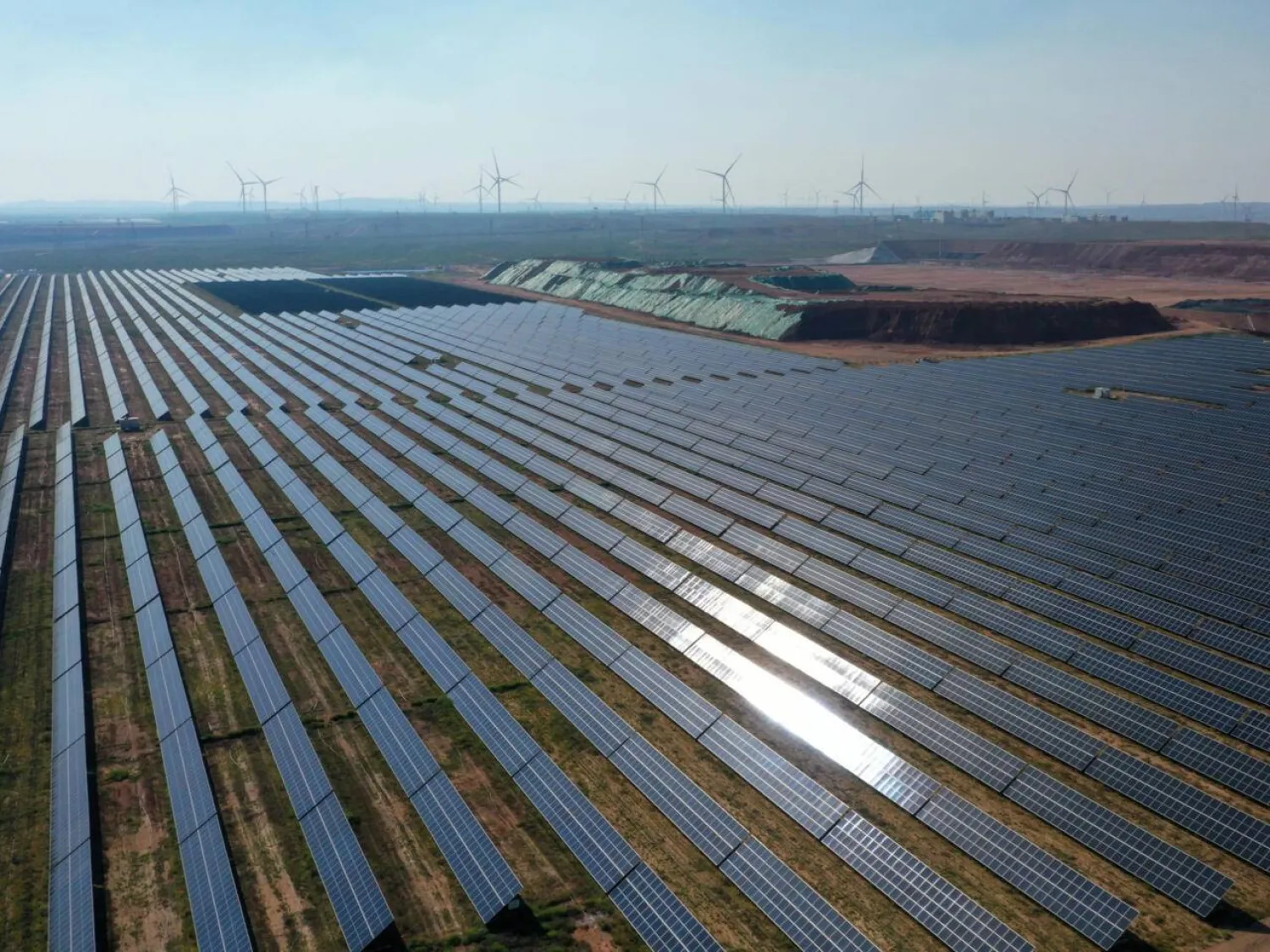 China said its wind and solar capacity overshot a target set by President Xi Jinping nearly six years ahead of schedule. GREG BAKER / AFP/File
