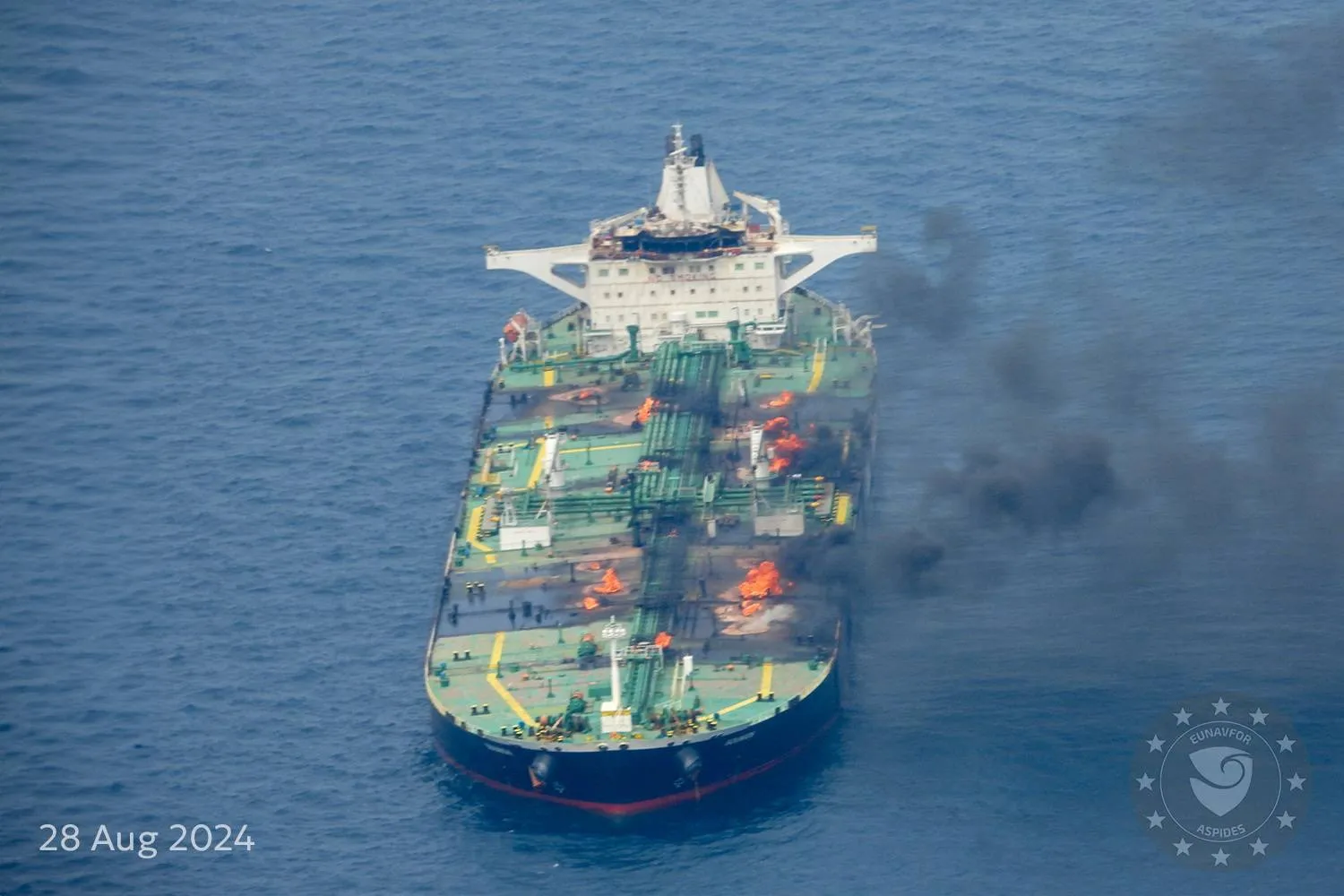 Flames and smoke rise from the Greek-flagged oil tanker Sounion, which has been on fire since August 23, on the Red Sea, August 28, 2024. EUNAVFOR ASPIDES via X/Handout via REUTERS 