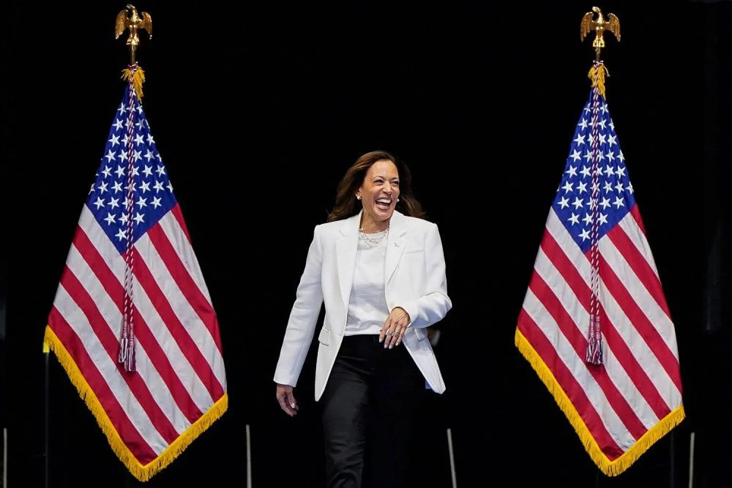 Democratic presidential nominee and US Vice President Kamala Harris reacts as she holds a campaign rally in Savannah, Georgia, US, August 29, 2024. (Reuters)