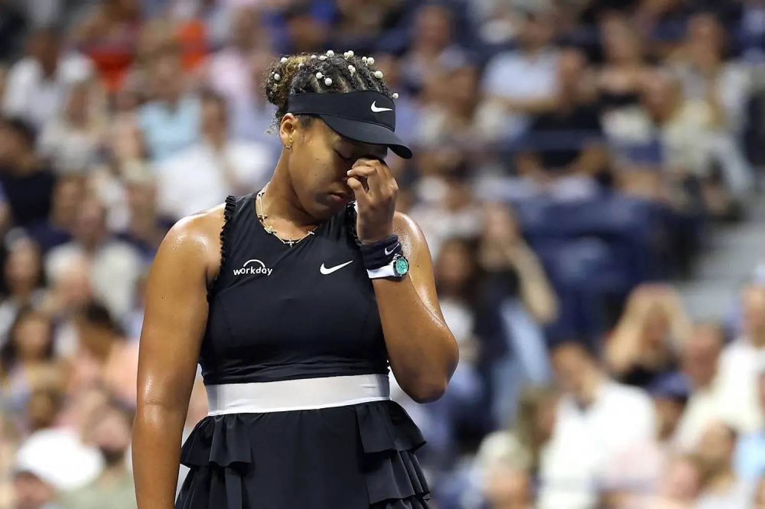 Japan's Naomi Osaka reacts during her women's singles second round tennis match against Czech Republic's Karolina Muchova on day four of the US Open tennis tournament at the USTA Billie Jean King National Tennis Center in New York City, on August 29, 2024. (AFP)