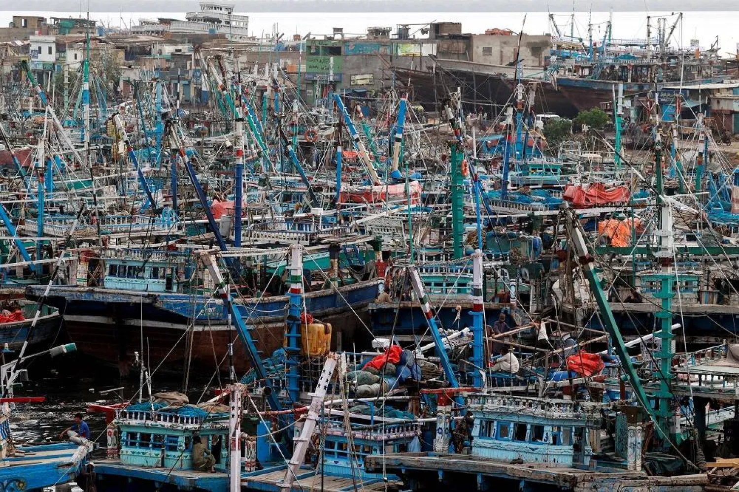 A view shows anchored fishing boats, after fishermen were advised not to venture into the sea due to expected cyclonic storm over the Arabian Sea, at Karachi's Fish Harbor, in Karachi, Pakistan August 29, 2024. (Reuters)