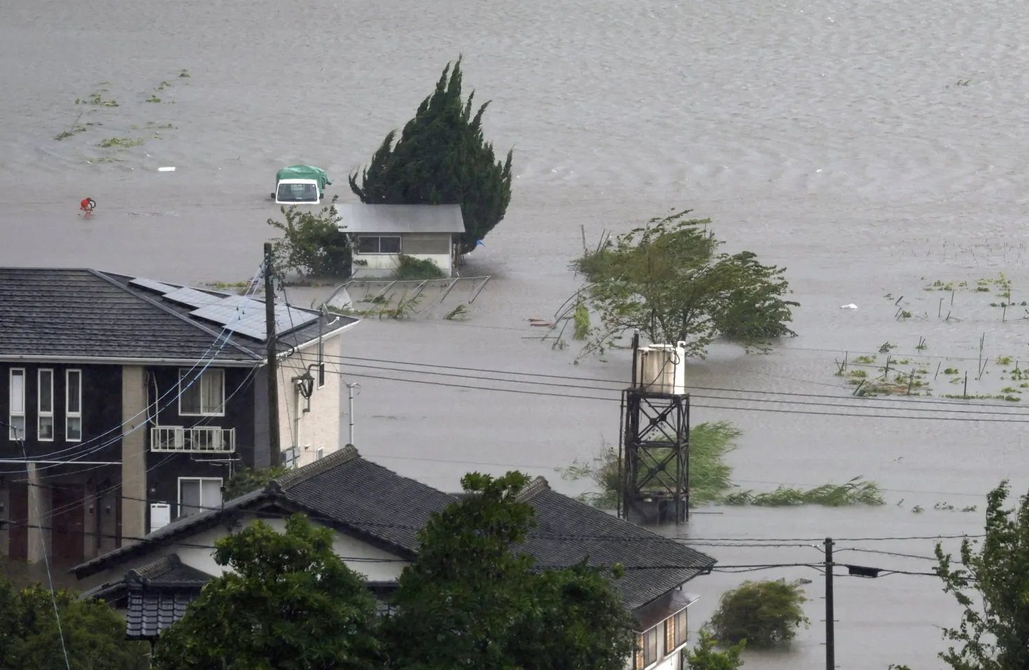 A farmland is submerged due to floods caused by heavy rains from Typhoon Shanshan in Yufu, Oita Prefecture, southwestern Japan, August 29, 2024, in this photo taken by Kyodo. Mandatory credit Kyodo/via REUTERS 