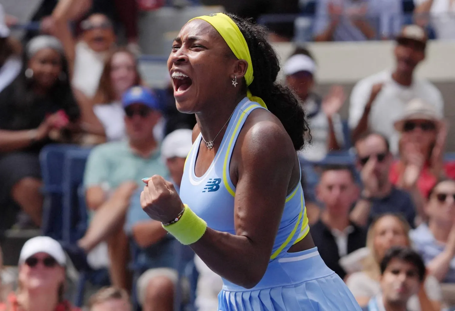 USA's Coco Gauff celebrates winning the second set against Ukraine's Elina Svitolina during their women's singles third round match on day five of the US Open tennis tournament at the USTA Billie Jean King National Tennis Center in New York City, on August 30, 2024. (Photo by TIMOTHY A. CLARY / AFP)