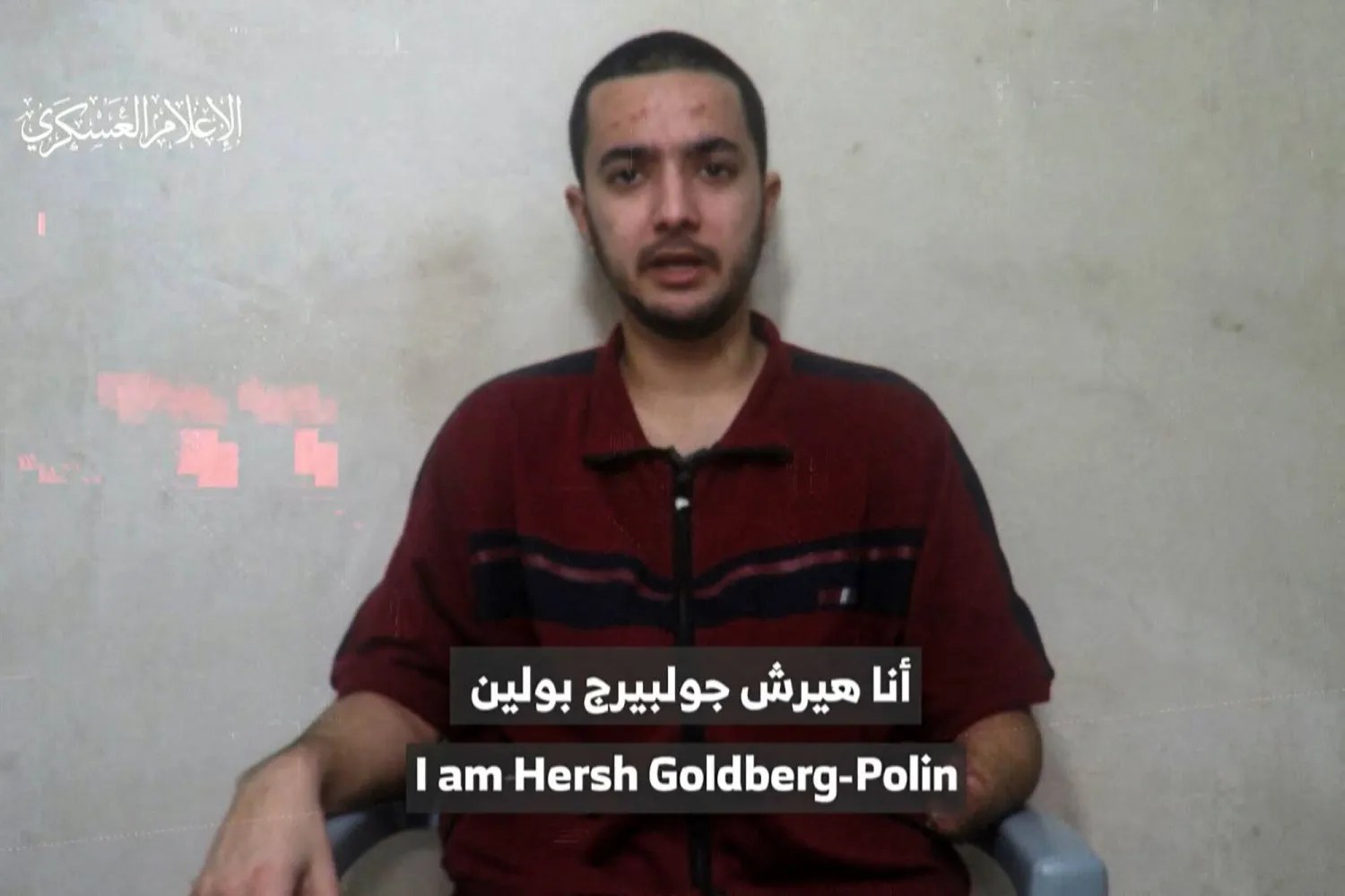 (FILES) An image grab from a video released by the media office of the Palestinian group Hamas on April 24, 2024, shows an Israeli-American man who identified himself as Hersh Goldberg-Polin, 23, one of the hostages abducted from the Nova music festival in southern Israel during the Hamas attack on October 7, 2023, speaking to a camera. (Photo by Hamas Media Office / various sources / AFP) 