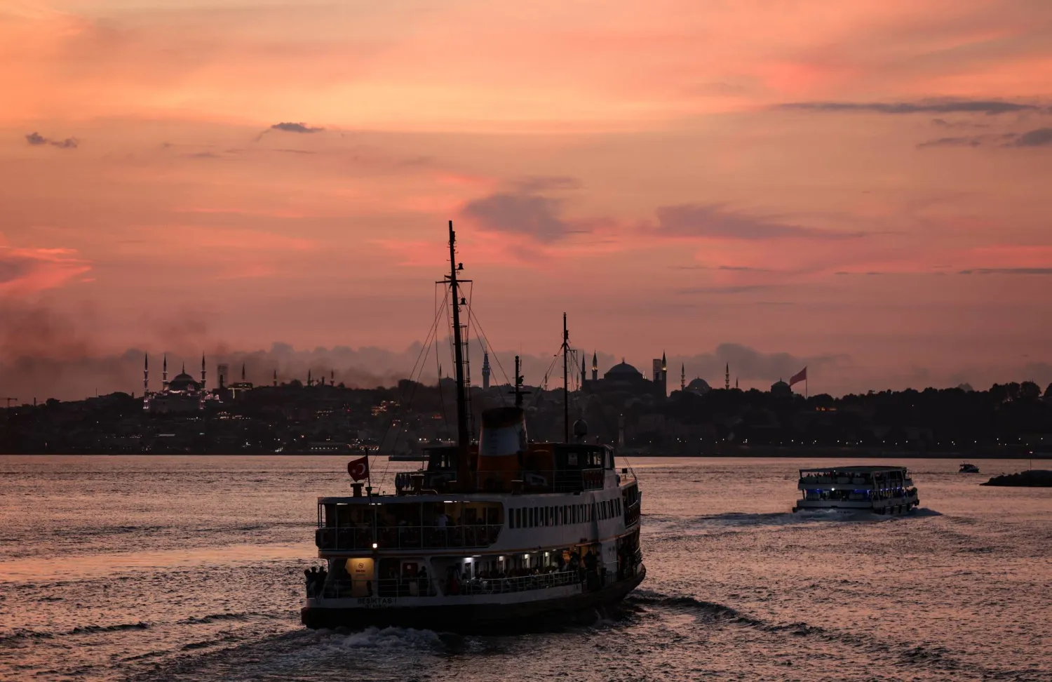 Ferries sail on the Bosphorus backdropped by the Blue Mosque during the sunset in Istanbul, Türkiye, 01 September 2024.  EPA/ERDEM SAHIN