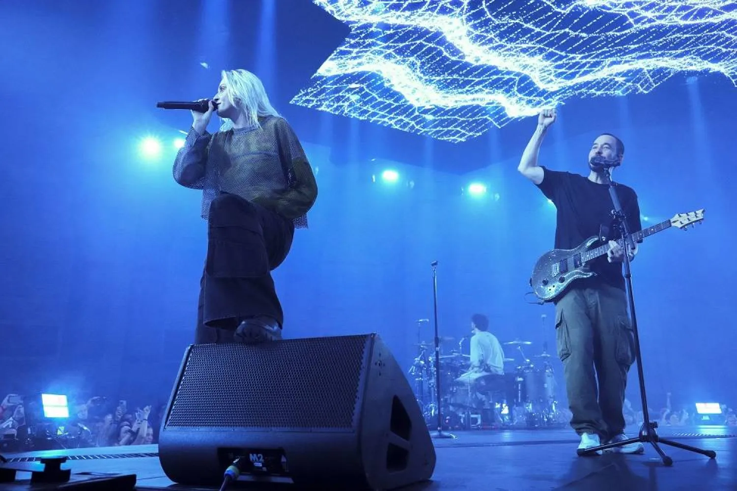 Emily Armstrong, from left, Colin Brittain, and Mike Shinoda of Linkin Park perform Thursday, Sept. 5, 2024, in Los Angeles. (AP)