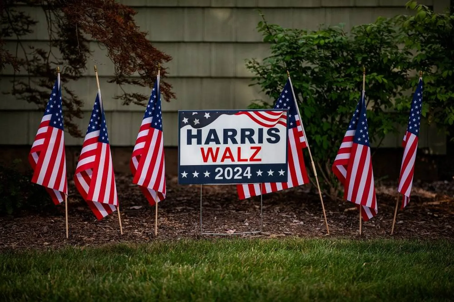 A lawn sign surrounded by American flags in support of US Vice President and Democratic presidential nominee Kamala Harris in Berkley, Michigan, US, September 5, 2024. (Reuters)