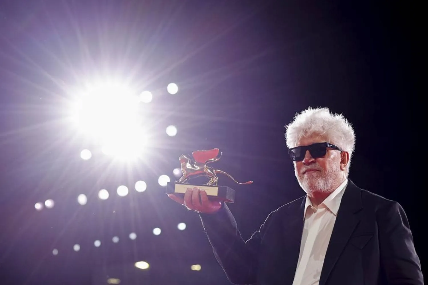 Spanish director and screenwriter Pedro Almodóvar holds the Golden Lion award for his movie "The Room Next Door" during the closing ceremony of the 81st annual Venice International Film Festival, in Venice, Italy, 07 September 2024. (EPA) 