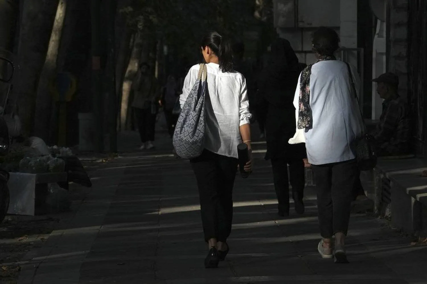 Iranian women walk in Tehran, Iran, Saturday, Aug. 5, 2023. (AP)
