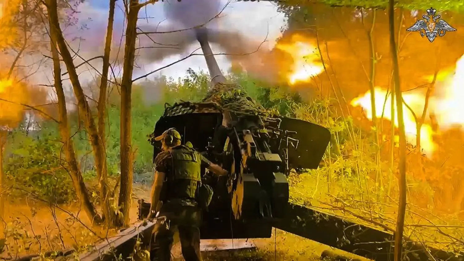  In this photo taken from video released by the Russian Defense Ministry on Friday, Sept. 13, 2024, a Russian soldier fires Msta-B howitzer toward a Ukrainian position in the Russian - Ukrainian border area in ​​the Kursk region, Russia. (Russian Defense Ministry Press Service photo via AP) 