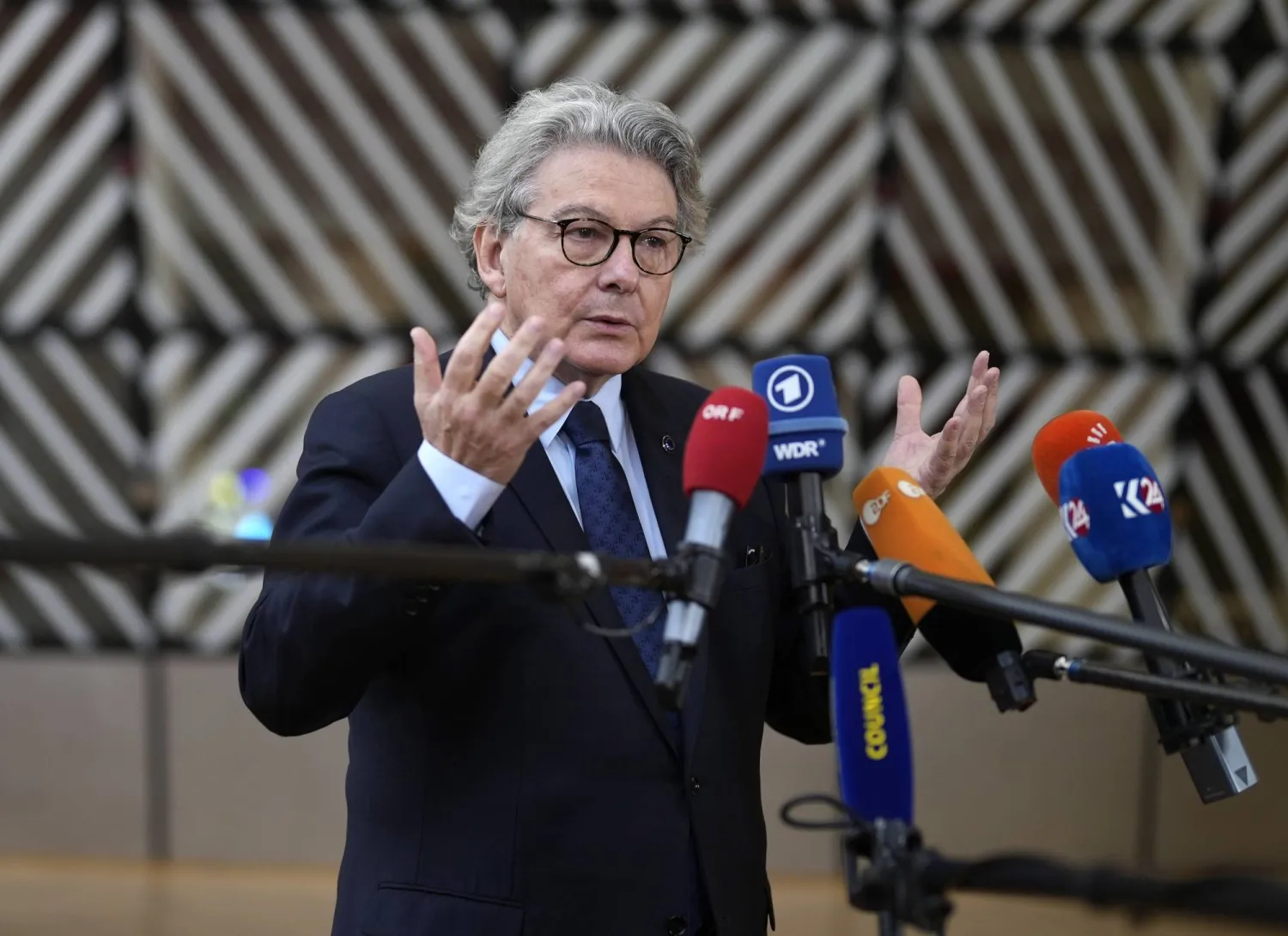 FILE - European Commissioner for Internal Market Thierry Breton speaks with the media as he arrives for a meeting of EU foreign and defense ministers at the European Council building in Brussels, on Nov. 14, 2023. (AP Photo/Virginia Mayo, File)