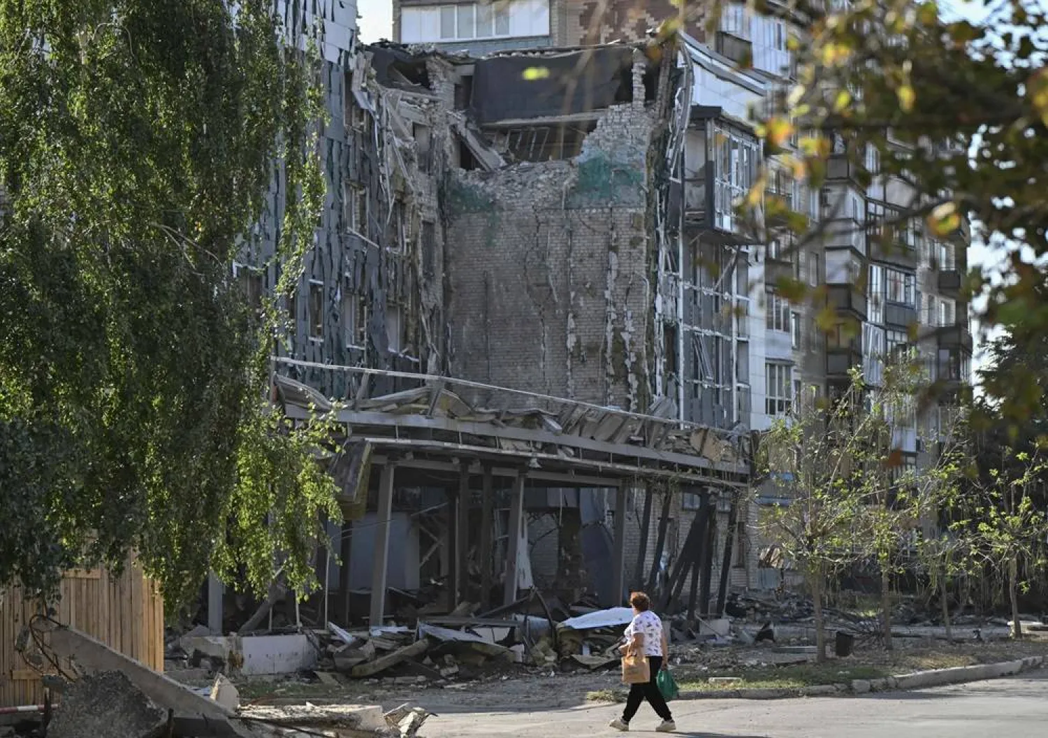 A local resident walks past a heavily damaged building in the town of Pokrovsk, Donetsk region, on September 20, 2024, amid the Russian invasion of Ukraine. (AFP)