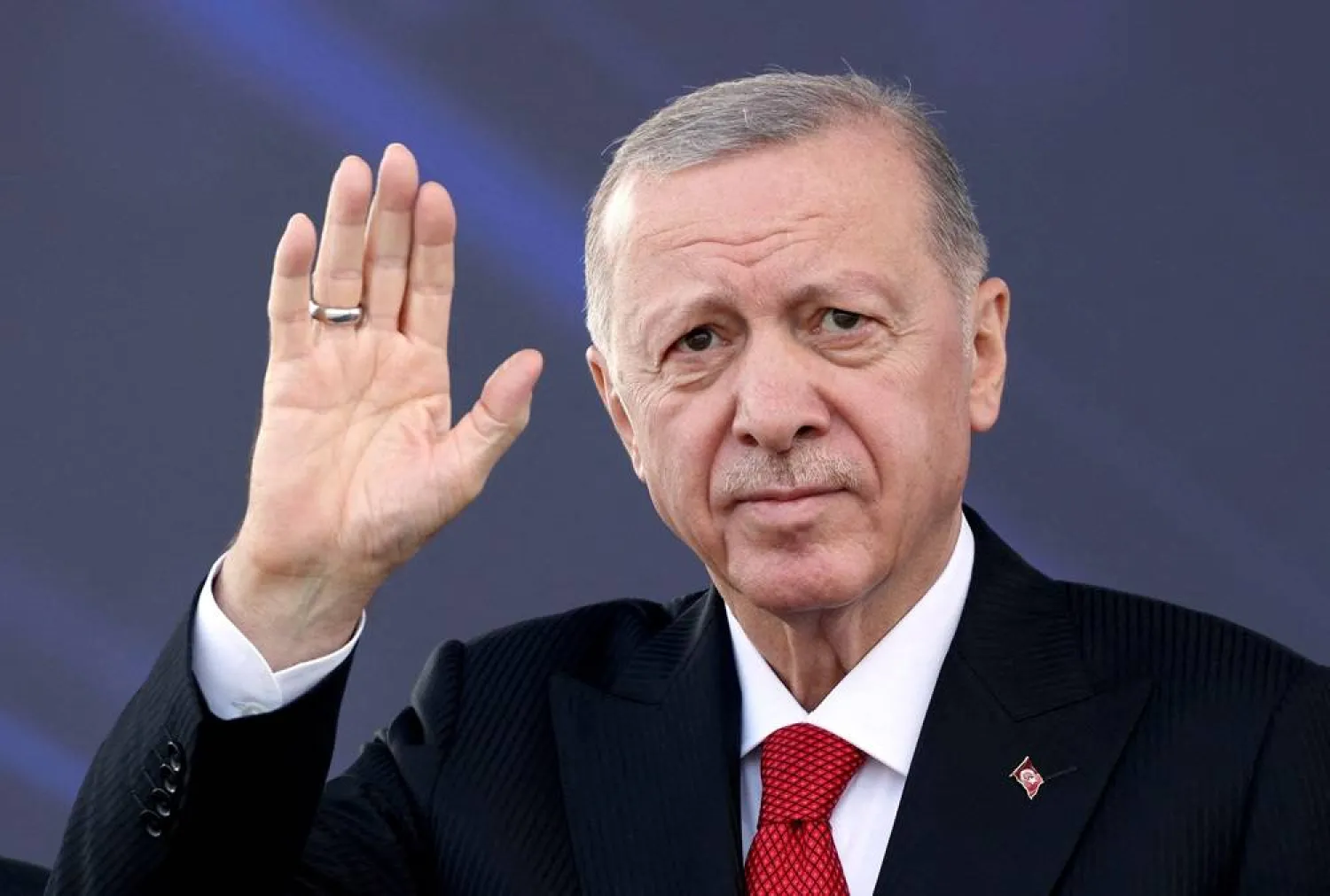  Turkish President Recep Tayyip Erdogan waves during a ceremony for the handover of new vehicles to the gendarmerie and police forces in Istanbul, Türkiye, September 20, 2024. (Reuters)