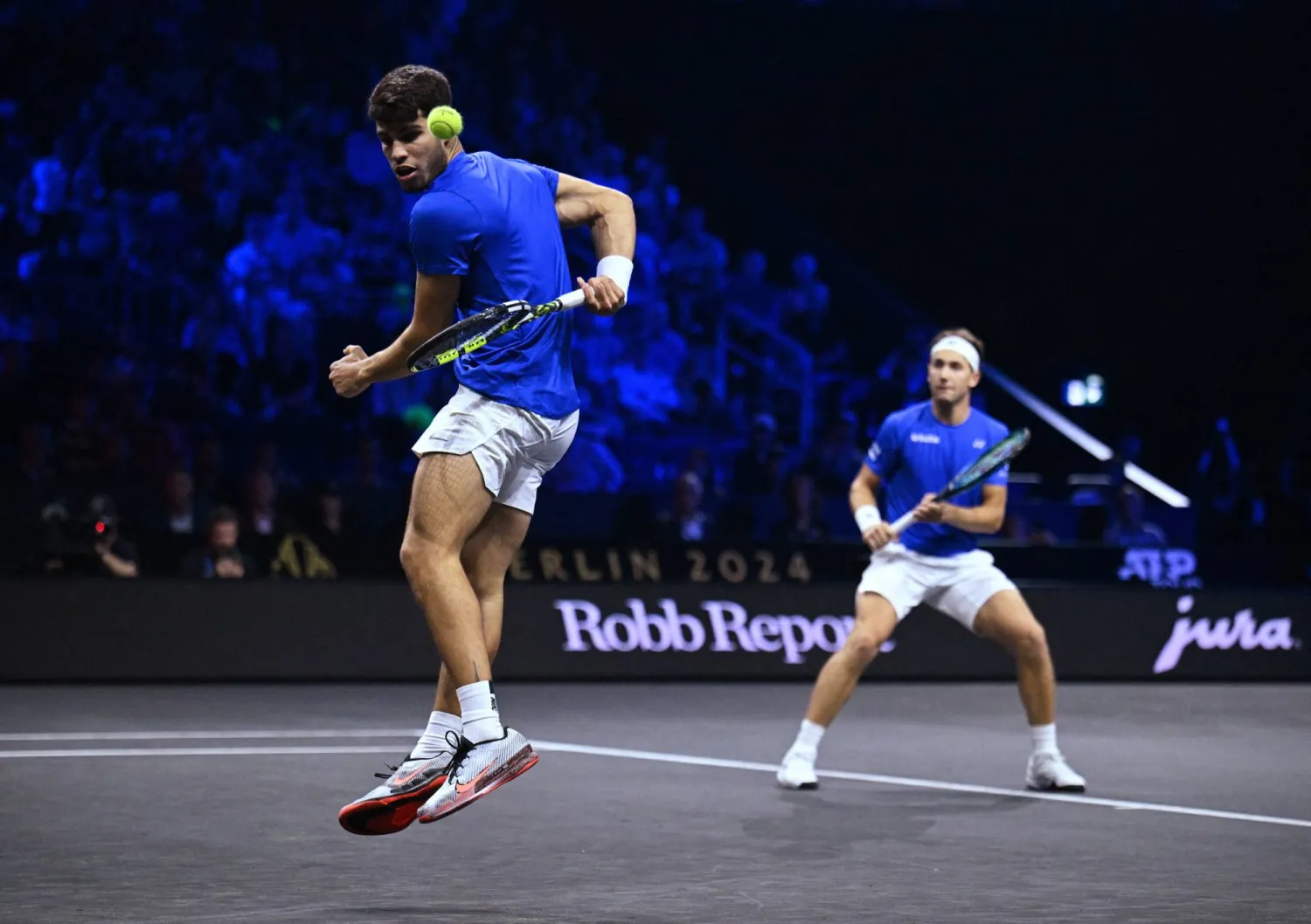 كارلوس ألكاراس وكاسبر رود (رويترز)