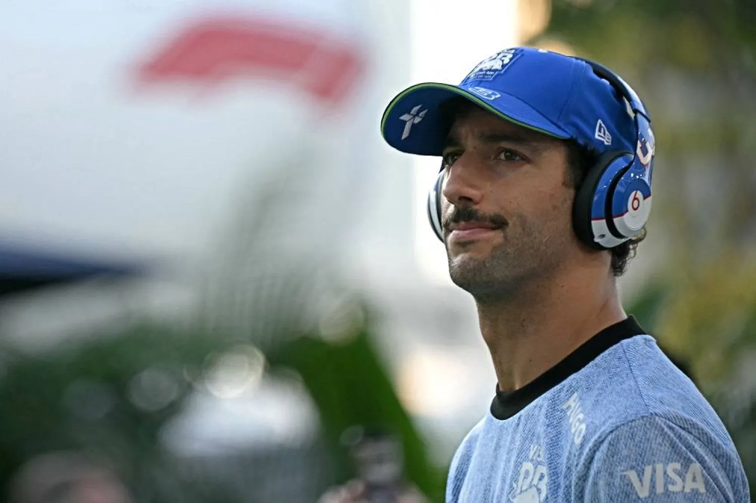 RB's Australian driver Daniel Ricciardo arrives for the drivers' parade before the Formula One Singapore Grand Prix night race at the Marina Bay Street Circuit in Singapore on September 22, 2024. (AFP)