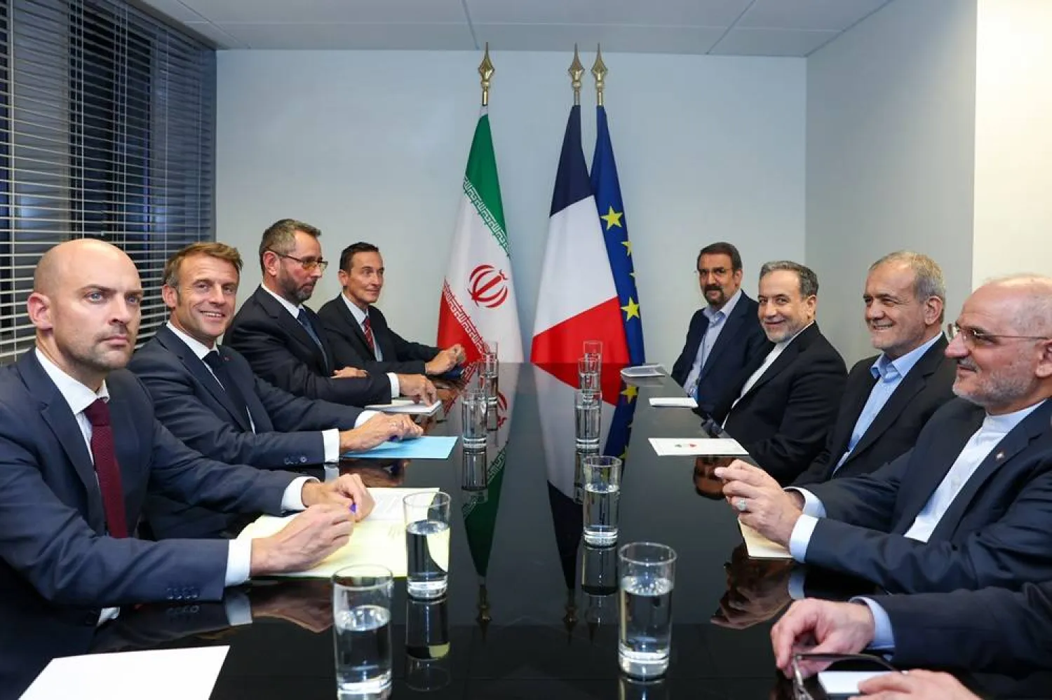 A handout photo made available by the Iranian presidency shows Iranian President Masoud Pezeshkian (2R) and French President Emmanuel Macron (2L) during a meeting on the sidelines of the 79th United Nations General Assembly session at United Nations Headquarters in New York, New York, USA, 24 September 2024 (issued 25 September 2024). (EPA/ Iranian presidency/ Handout) 