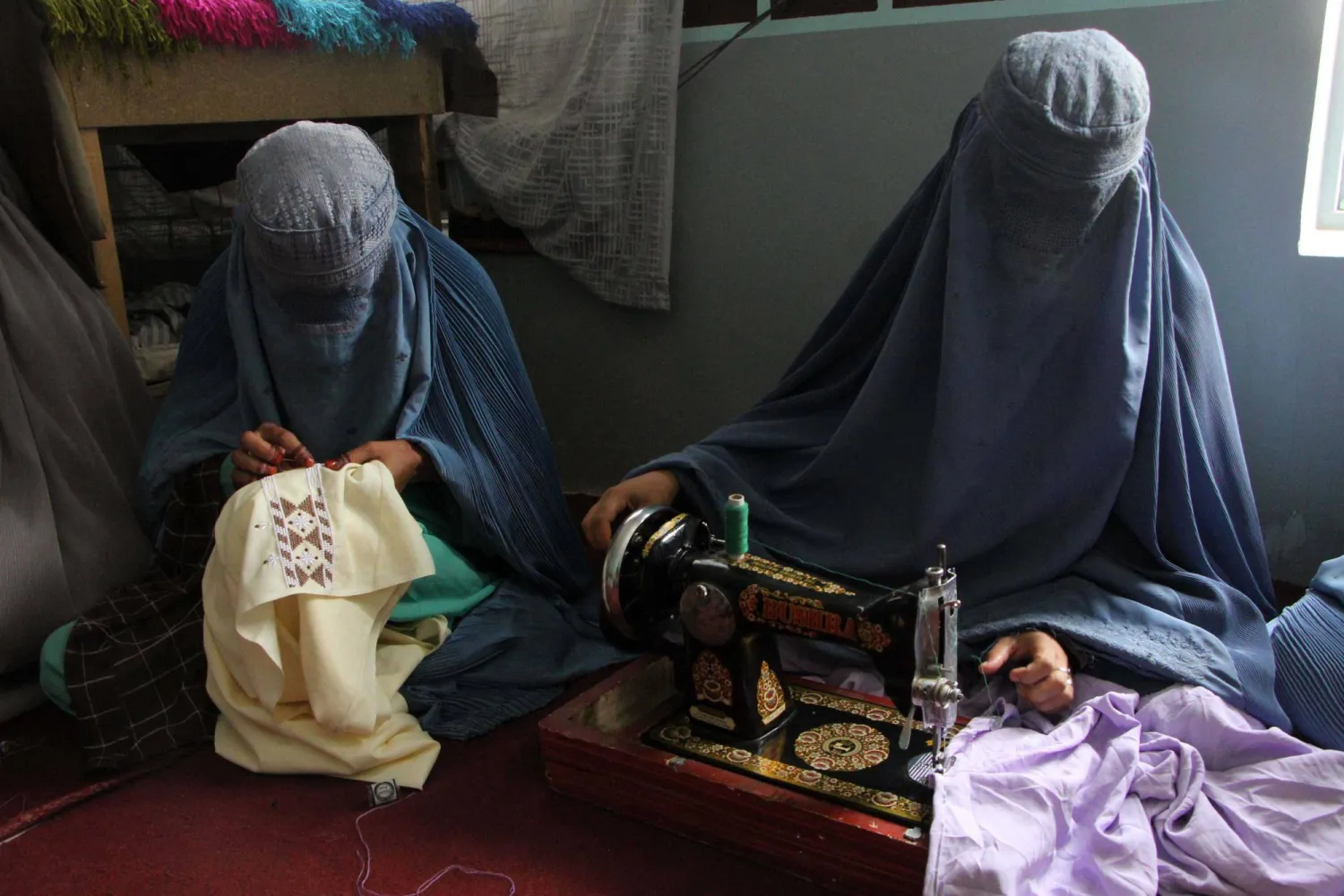 Afghan women stitch clothes at a workshop in Kandahar, Afghanistan, 04 September 2024. EPA/QUDRATULLAH RAZWAN