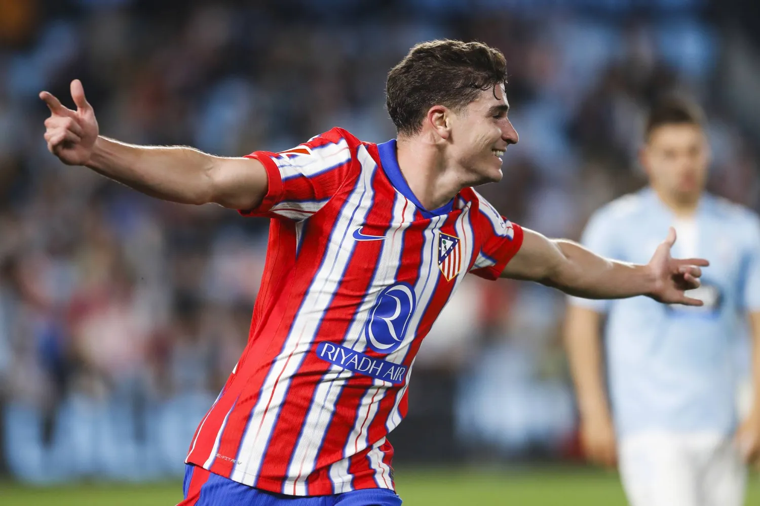 Atletico's Julian Alvarez celebrates after scoring the 0-1 goal during the Spanish LaLiga soccer match between Celta Vigo and Atletico Madrid, in Vigo, Spain, 26 September 2024. EPA/SALVADOR SAS
