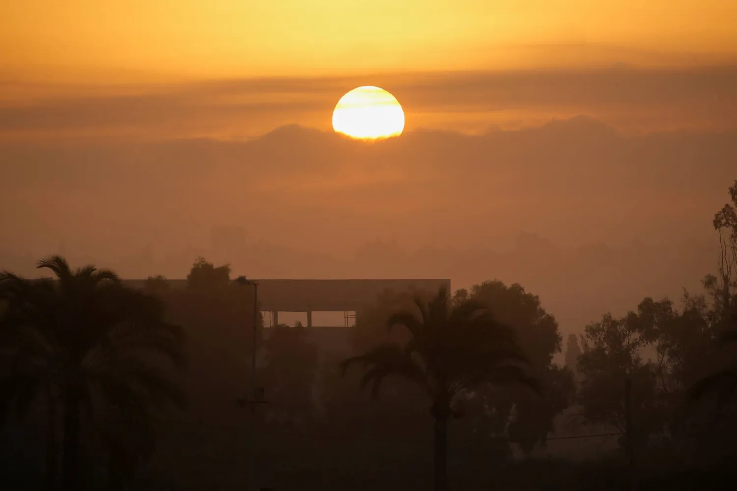 A view of the sunrise, amid ongoing hostilities between Hezbollah and Israeli forces, in Tyre, Lebanon, September 28, 2024. REUTERS/Amr Abdallah Dalsh