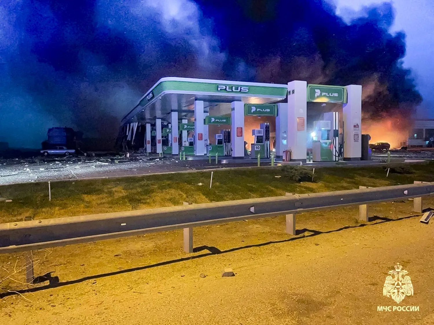 In this photo released by Russian Emergency Ministry Press Service on Saturday, Sept. 28, 2024, smoke and fire rises after an explosion killed multiple people at a gas station in the suburbs of Dagestan capital Makhachkala in Russia's Caspian Sea region. (Russian Emergency Ministry Press Service via AP)