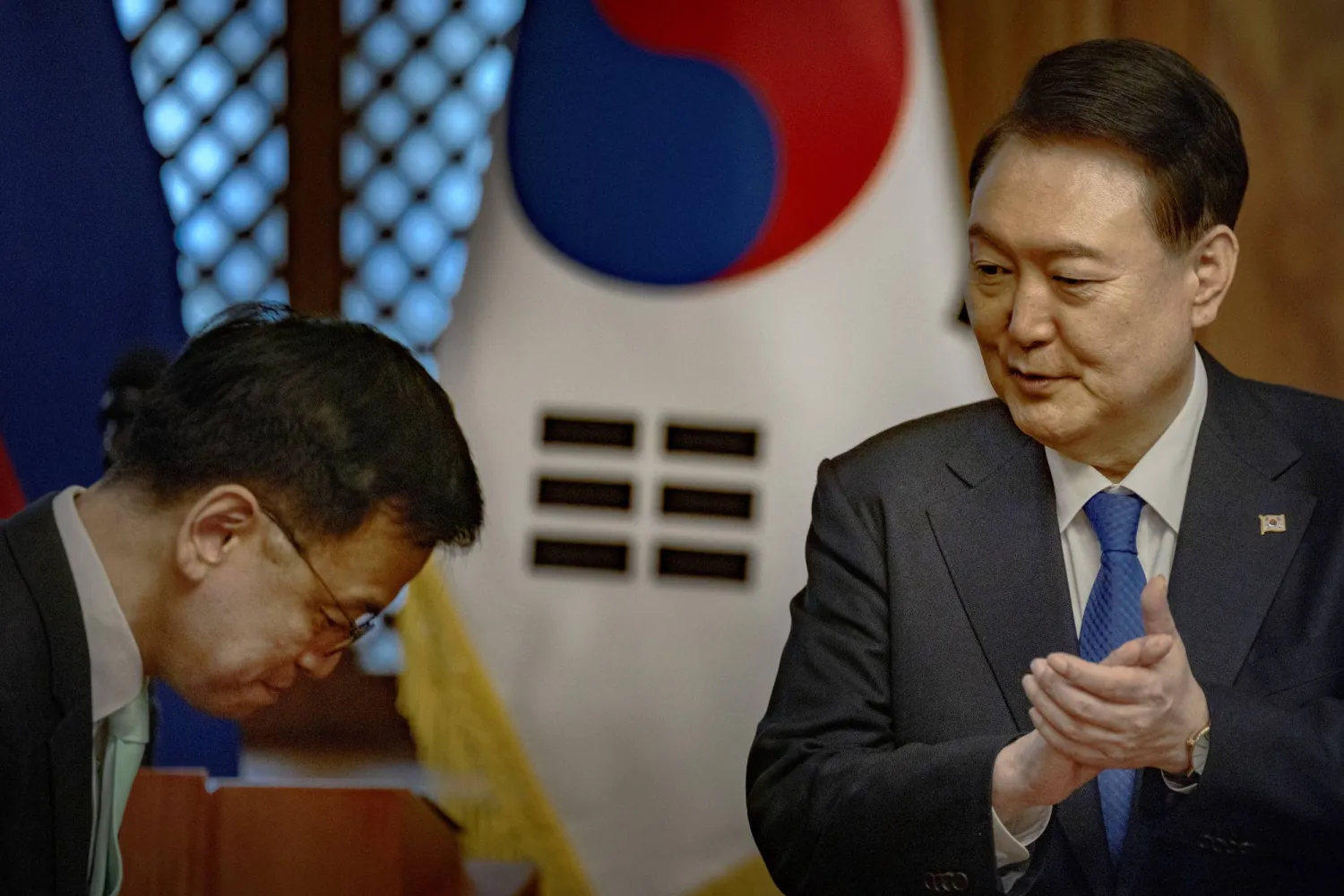 South Korean President Yoon Suk Yeol (R) applauds during a meeting with the Philippine president at the Malacanang Palace in Manila, Philippines, 07 October 2024. EPA/EZRA ACAYAN / POOL