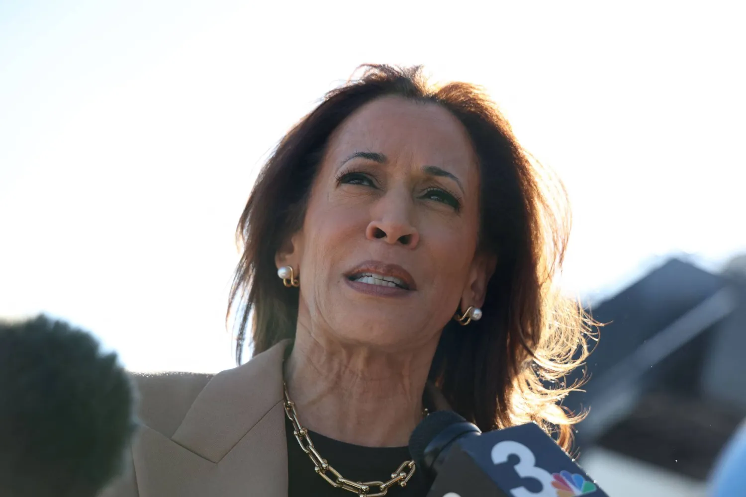 US Vice President and Democratic presidential candidate Kamala Harris speaks to the press before boarding Air Force Two at Harry Reid International Airport in Las Vegas, Nevada, as she travels to Arizona. (Photo by RONDA CHURCHILL / AFP)