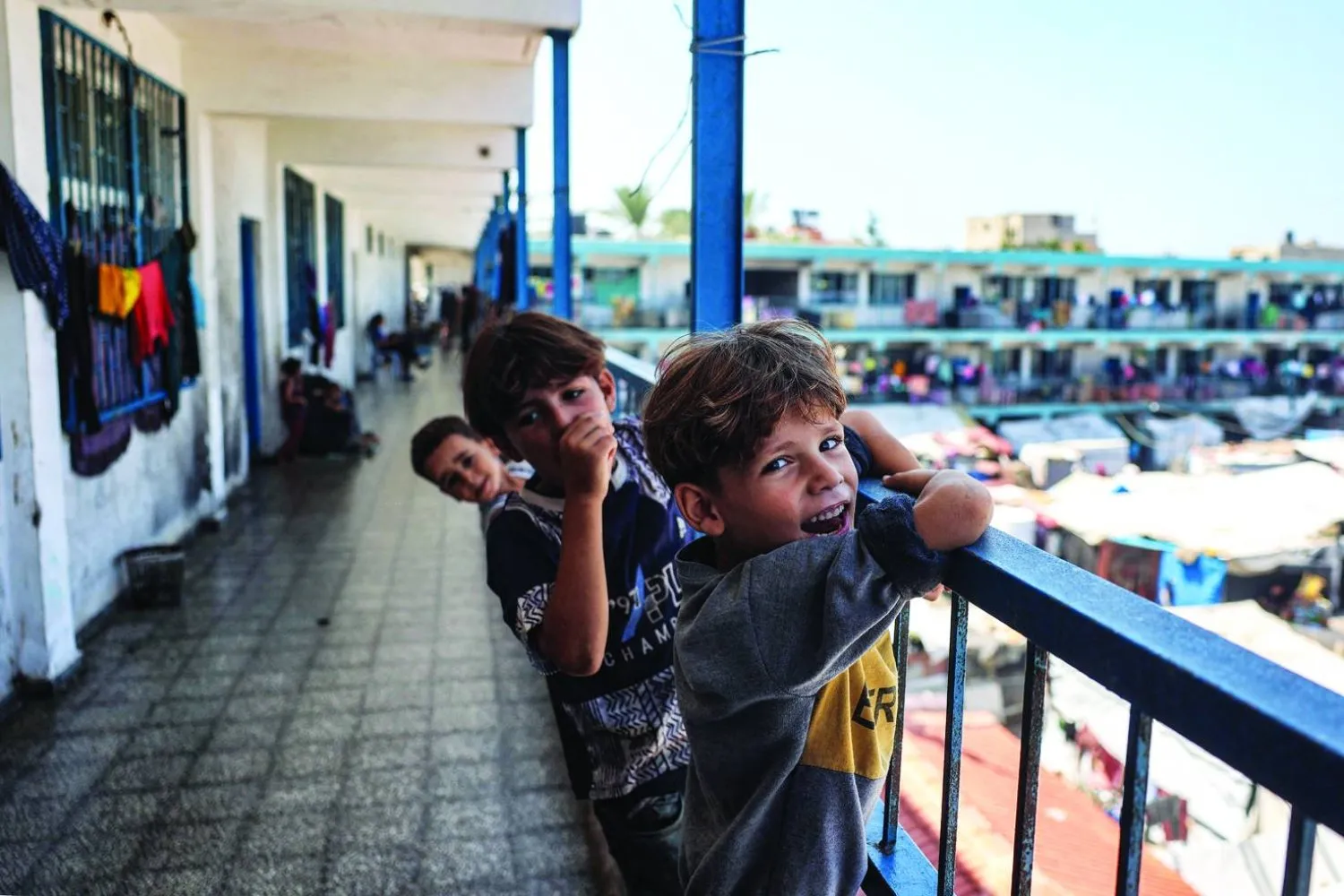  Gazze'nin Deyr al-Balah kentinde UNRWA merkezindeki çocuklar (Arşiv-AFP)