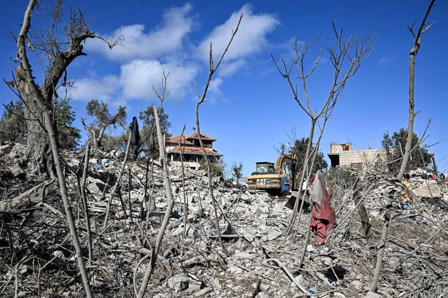 This picture shows debris and rubble at the site of a previous Israeli air strike on the village of Aito in northern Lebanon on October 15, 2024. (AFP)