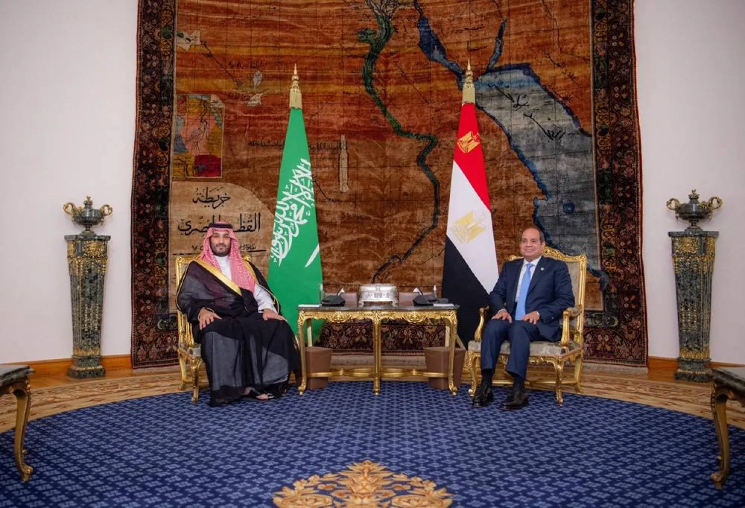 Prince Mohammed bin Salman, Saudi Crown Prince and Prime Minister, and Egyptian President Abdel Fattah al-Sisi meet in Cairo on Tuesday. (AFP/Handout/SPA) 