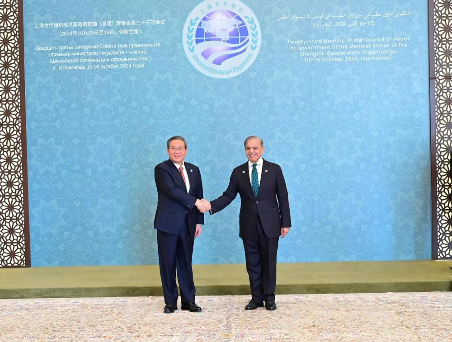  Prime Minister Muhammad Shehbaz Sharif receives the Chinese Premier Li Qiang, at the venue of the 23rd Shanghai Cooperation Organization (SCO) on the Council of Heads of Government Meeting in Islamabad, Pakistan October 16, 2024. Press Information Department (PID)/Handout via Reuters