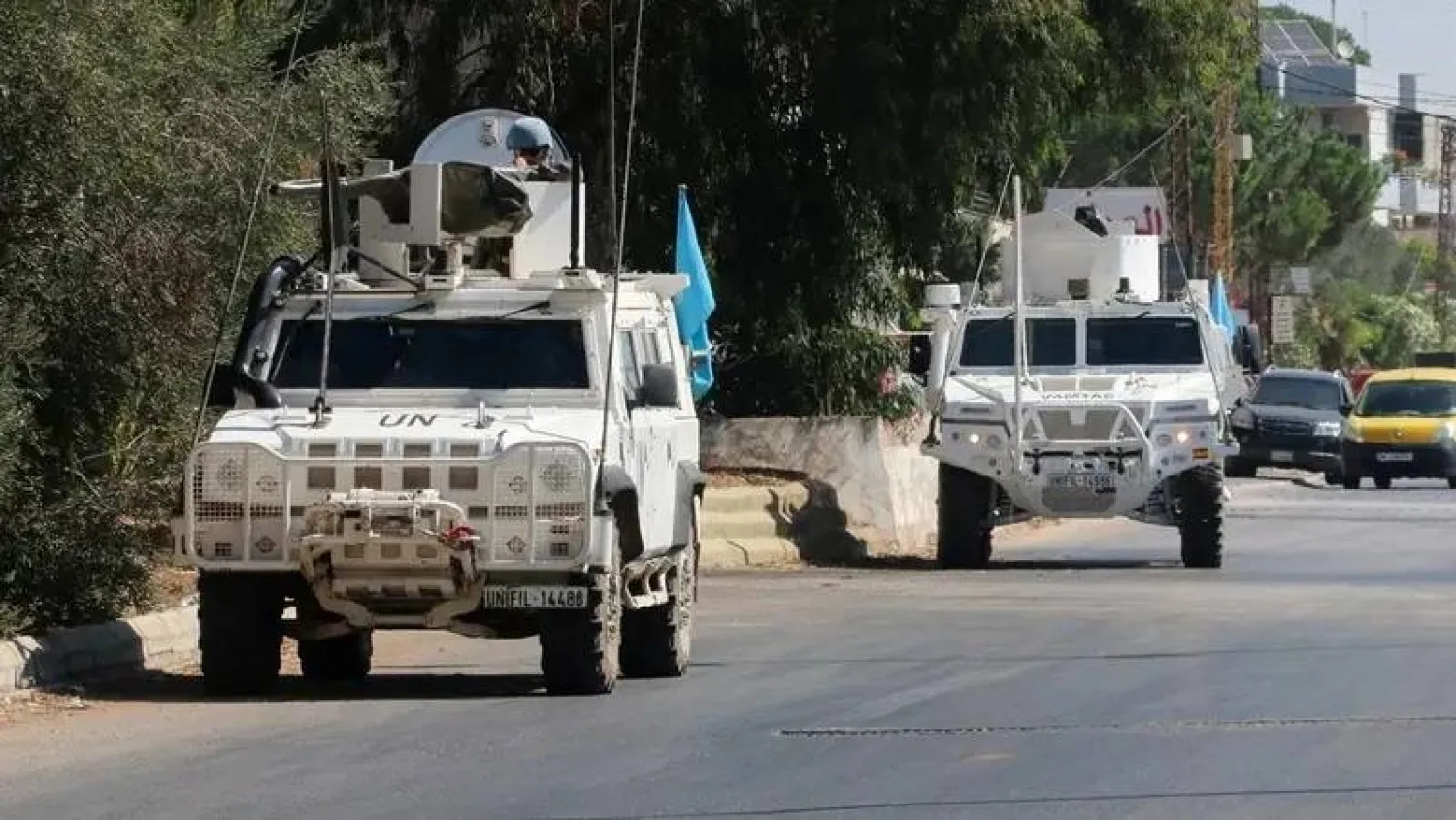 UN peacekeepers (UNIFIL) vehicles are seen parked in Marjayoun, near the border with Israel, in southern Lebanon on August 9, 2024. (Reuters)
