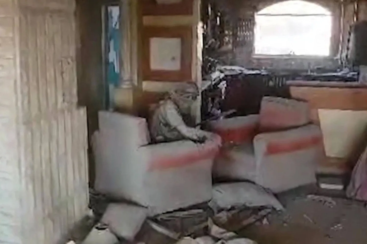 This screen grab from a handout video released by the Israeli army on October 17, 2024, shows what it says is a drone footage of Hamas leader Yahya Sinwar moments before he was killed, in the neighborhood of Tal al-Sultan in Rafah in the southern Gaza Strip. (Photo by Israel Army / AFP)