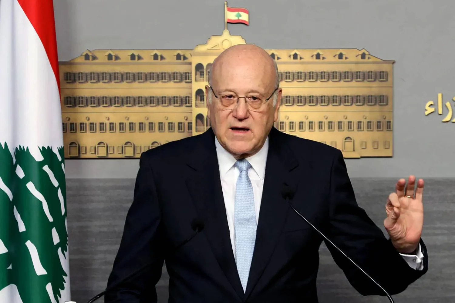 This handout picture provided by the Lebanese Prime Minister's press office shows Lebanon's caretaker Prime Minister Najib Mikati delivering a statement to the press in Beirut on October 11, 2024. (Photo by Lebanese Prime Minister's Press Office / AFP) 