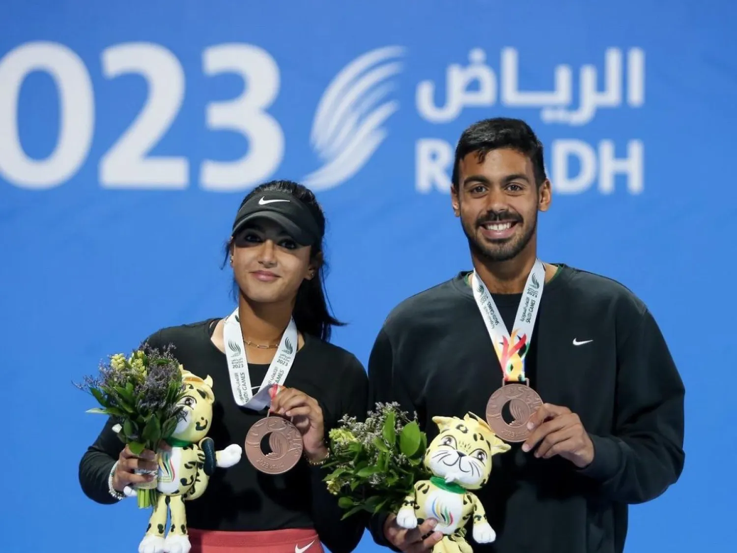 الشقيقان عبد المجيد ولارا بخاري  (الاتحاد السعودي للتنس)