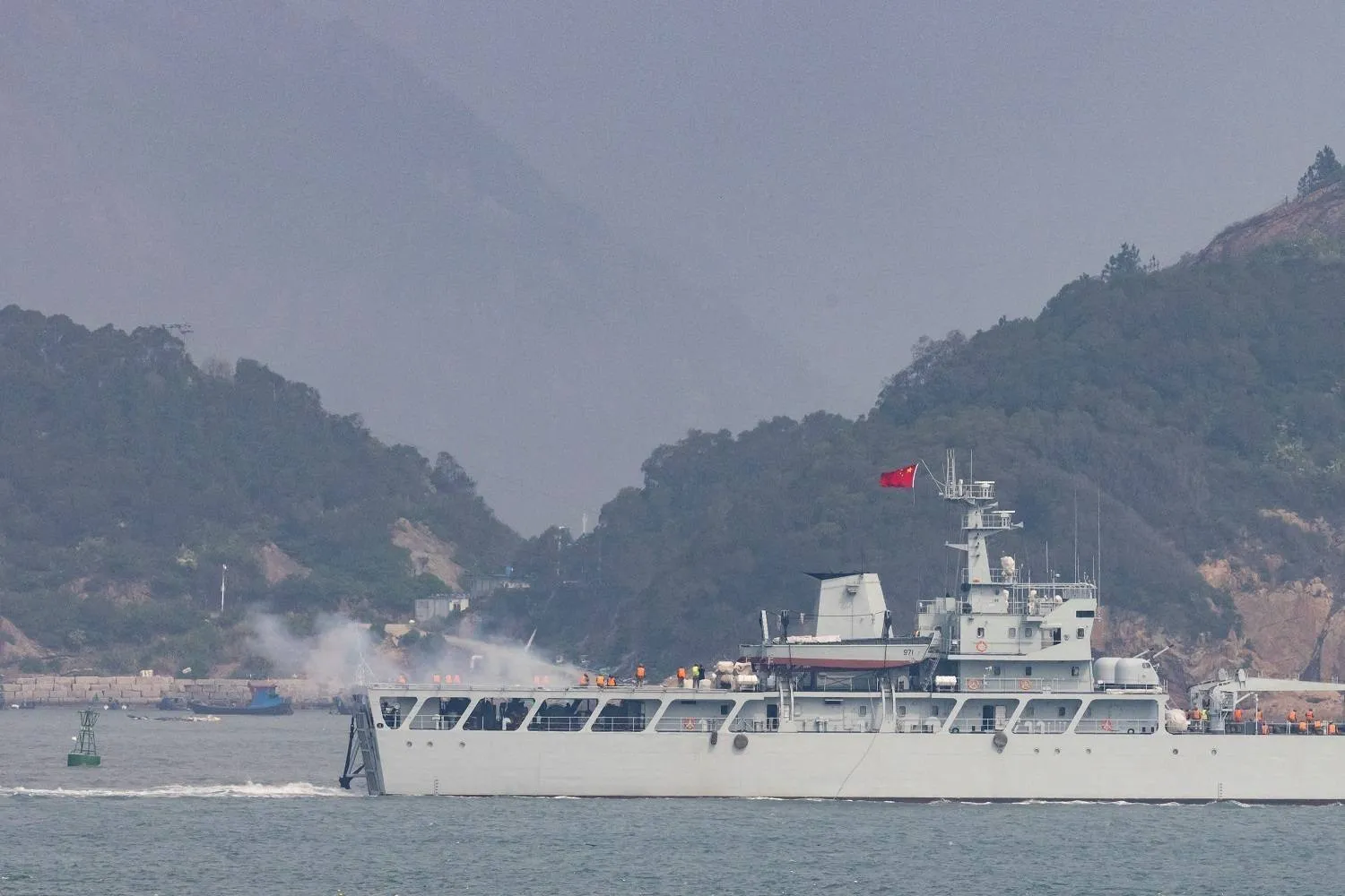 A Chinese warship opens fire during military exercises near Taiwan (archive - Reuters).