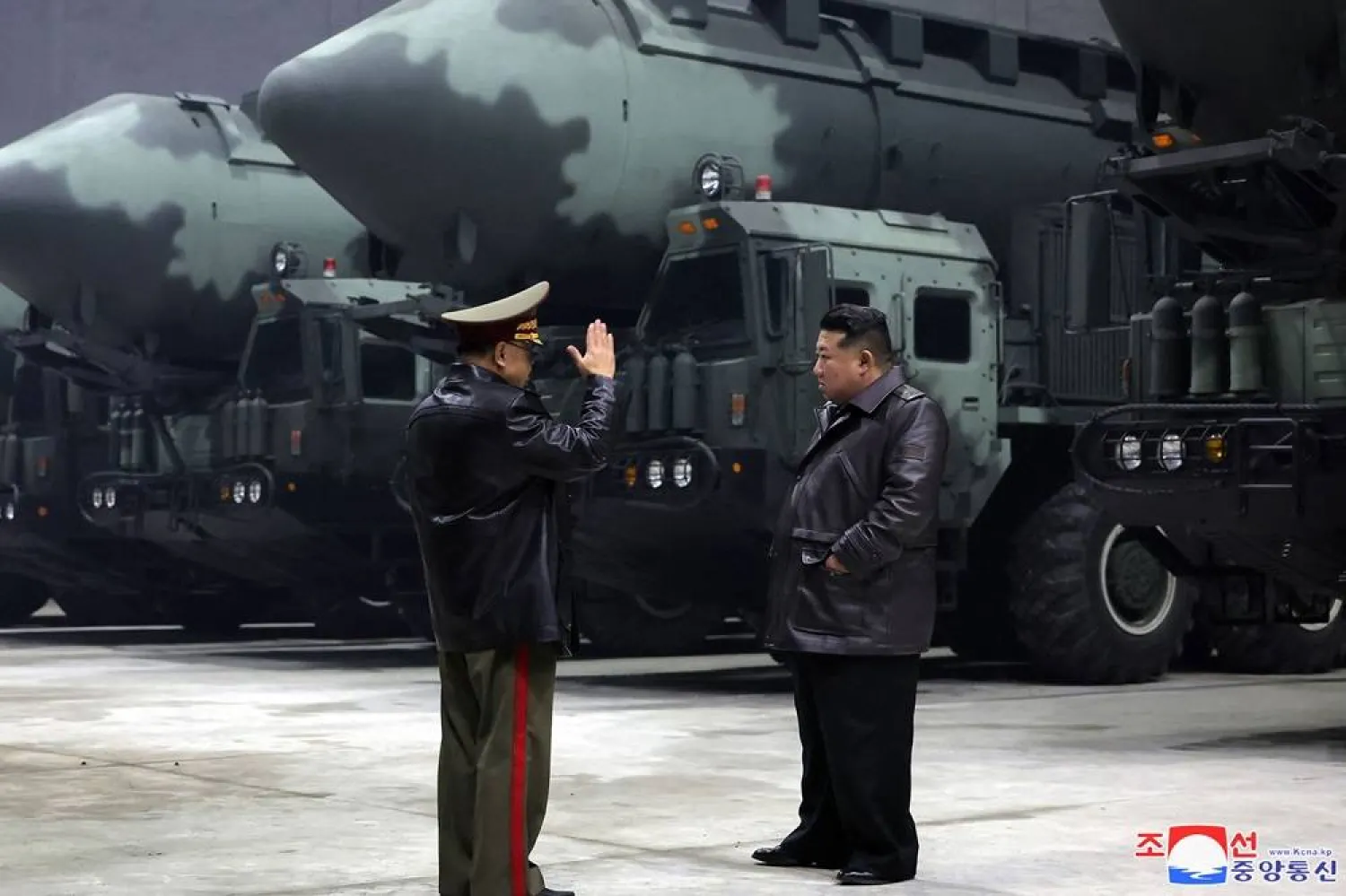This undated picture released from North Korea's official Korean Central News Agency (KCNA) via KNS on October 23, 2024 shows North Korea's leader Kim Jong Un (R) visiting a strategic missile base at an undisclosed location in North Korea. (KCNA via KNS / AFP) 