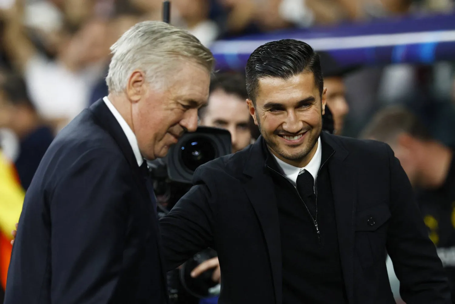 أنشيلوتي وشاهين قبل مباراة الريال ودورتموند (رويترز)