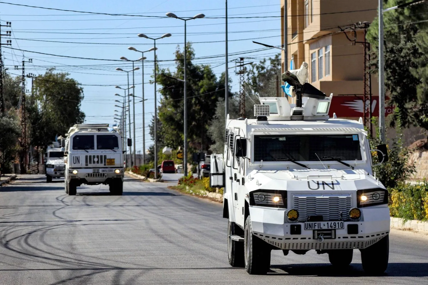 Vehicles from the United Nations Interim Force in Lebanon (UNIFIL) patrol in Marjayoun in southern Lebanon (AFP)