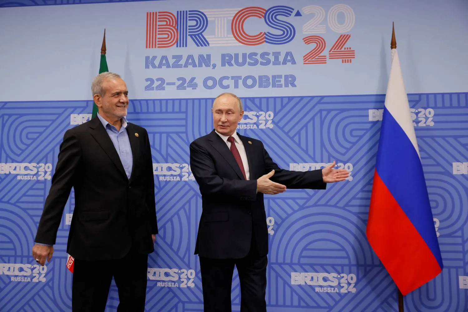Russian President Vladimir Putin and his Iranian counterpart Masoud Pezeshkian during the BRICS summit, October 23, 2024 (Reuters)