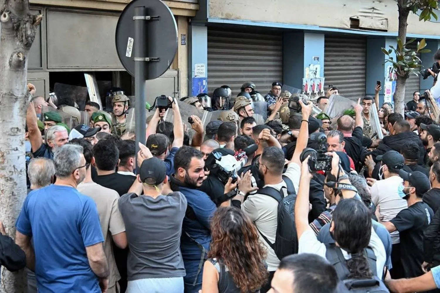 Lebanese civilians argue with army soldiers as they attempt to evict internally displaced people from an old hotel's premises, at Hamra Street in Beirut, Lebanon, 21 October 2024. (EPA)
