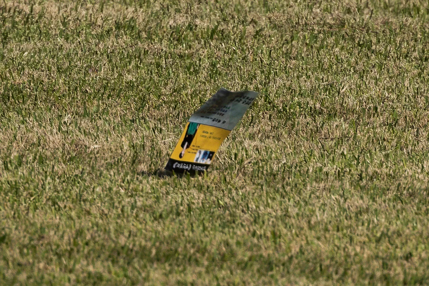 A propaganda leaflet believed to be from North Korea is seen on the ground prior to a welcoming ceremony for Poland's President Andrzej Duda at the Presidential Office in Seoul on October 24, 2024. (Photo by JEON HEON-KYUN / POOL / AFP)