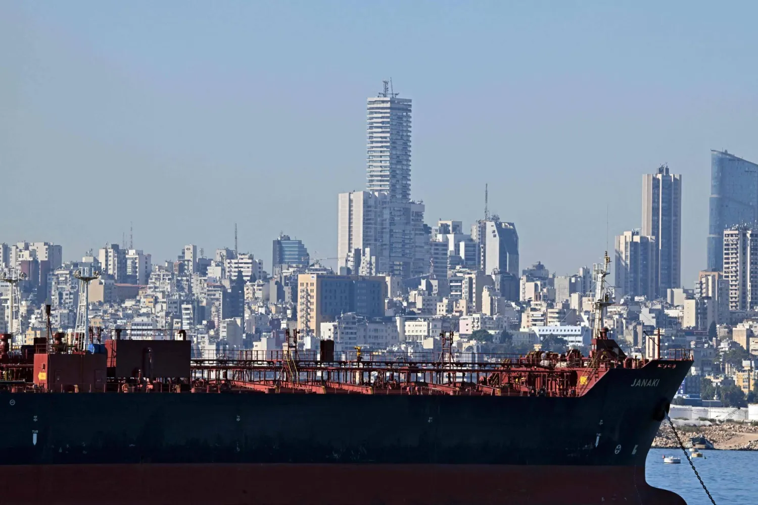 This picture taken from the area of Dbayeh north of Beirut shows an oil tanker docked off the coast of Beirut on October 24, 2024 amid the ongoing war between Israel and Hezbollah. (Photo by Joseph EID / AFP)