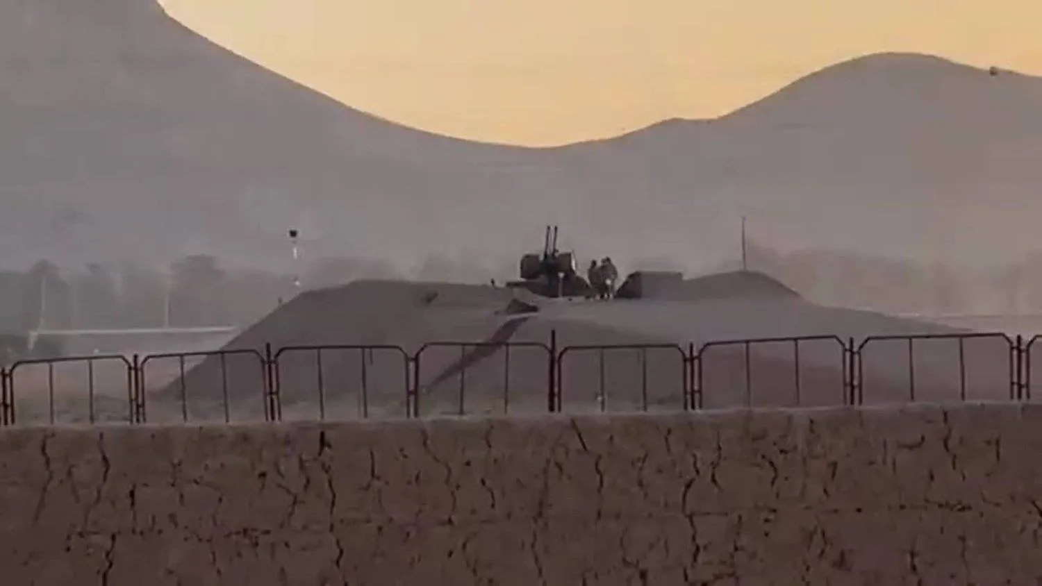 Military personnel stand guard at a nuclear facility in the Zardanjan area of Isfahan, Iran, April 19, 2024, in this screengrab taken from video (Reuters)
