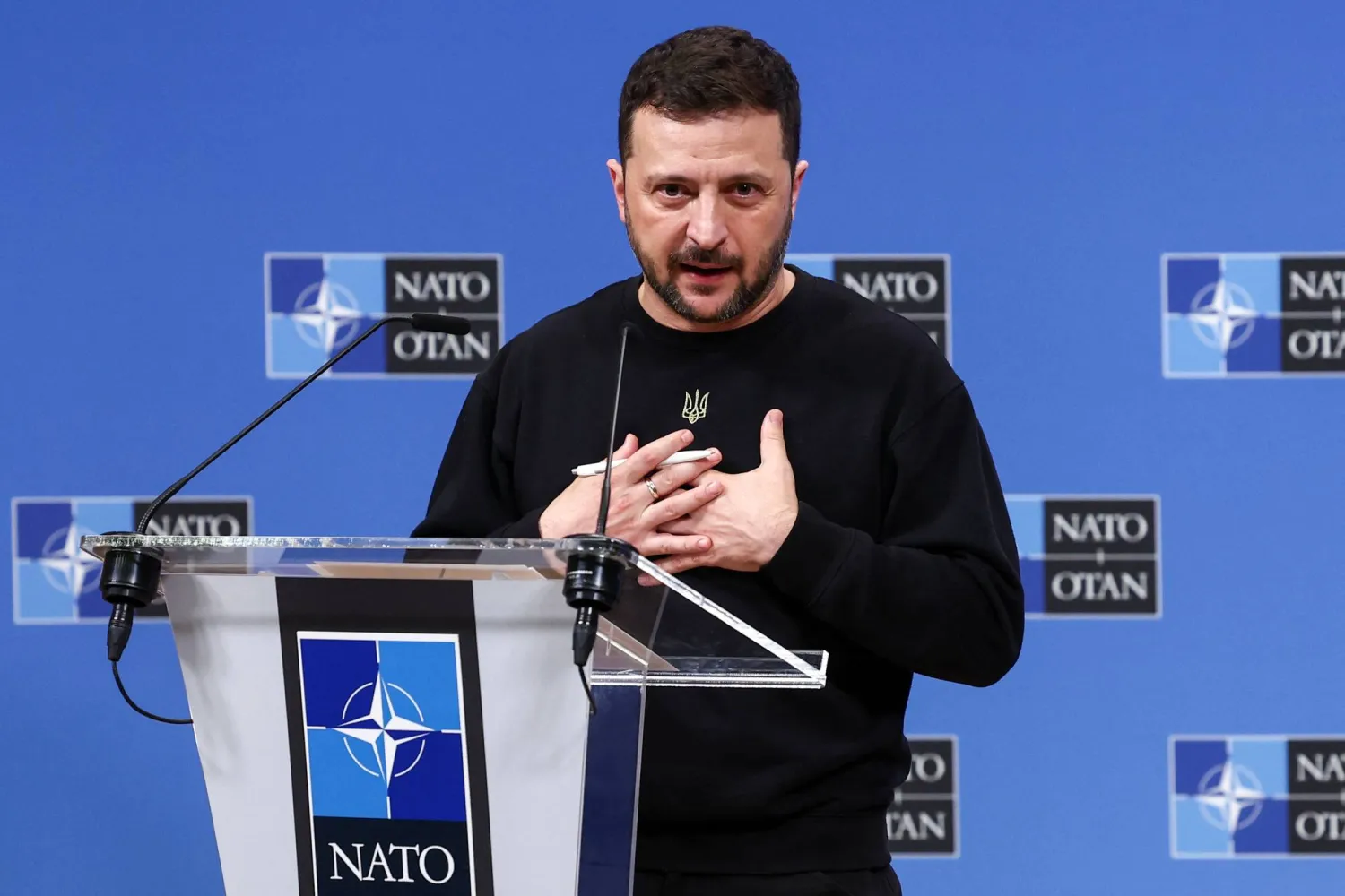 Ukraine's President Volodymyr Zelenskiy attends a press conference, at the NATO headquarters in Brussels, Belgium October 17, 2024. REUTERS/Yves Herman
