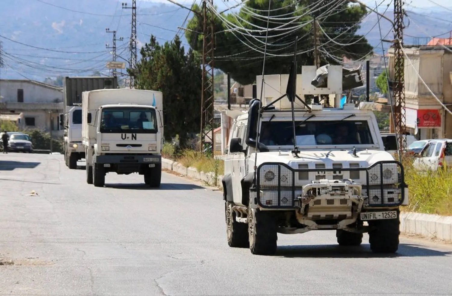 United Nations peacekeepers (UNIFIL) vehicles drive in the town of Qlayaa, near the border with Israel, amid ongoing hostilities between Hezbollah and Israeli forces, southern Lebanon October 19, 2024. (Reuters) 