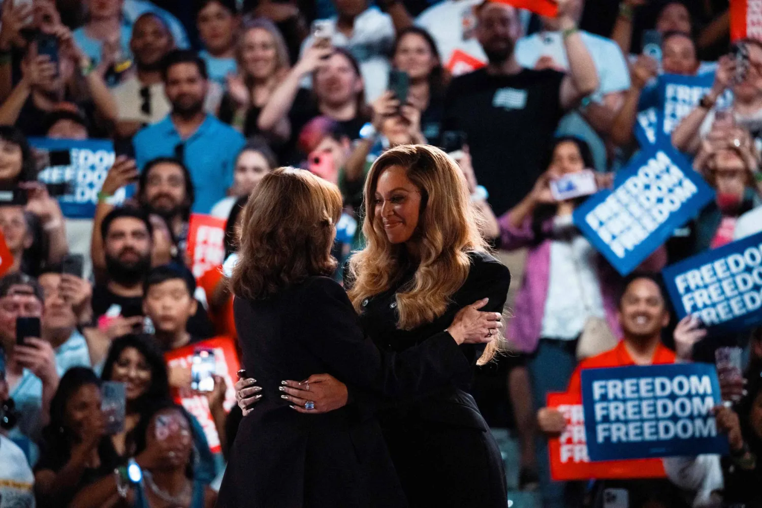 HOUSTON, TEXAS - OCTOBER 25: Democratic presidential nominee, Vice President Kamala Harris embraces singer Beyoncé at a campaign rally on October 25, 2024 in Houston, Texas. Jordan Vonderhaar/Getty Images/AFP 