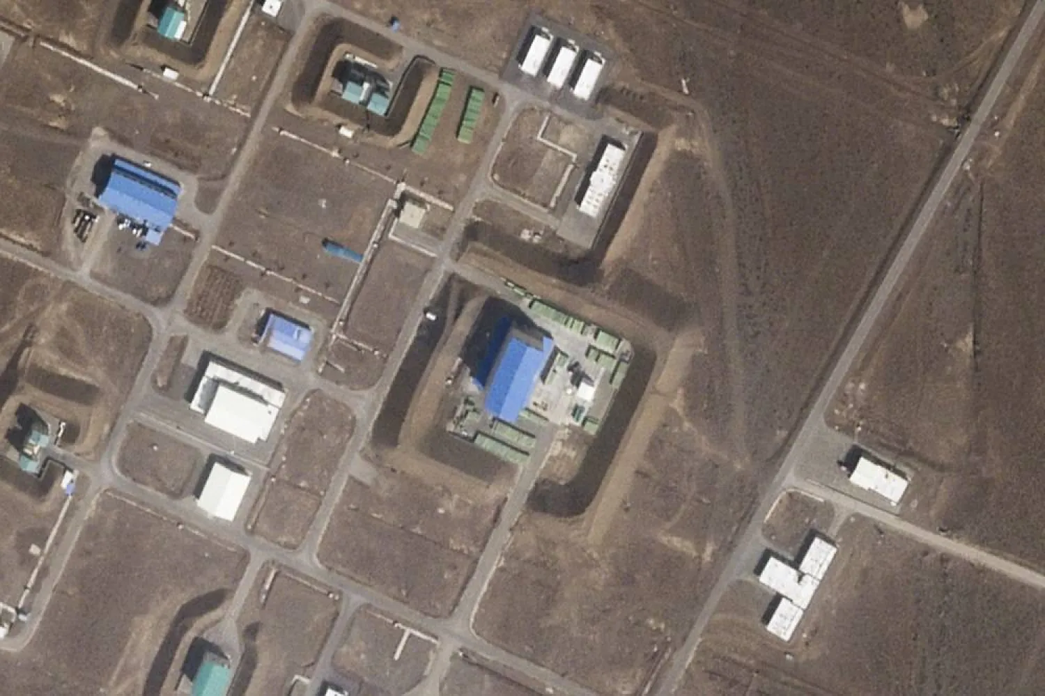 This satellite photo from Planet Labs PBC shows a large building at the Revolutionary Guard's Shahroud Space Center in Semnan province, Iran, March 19, 2024. (Planet Labs PBC via AP) 