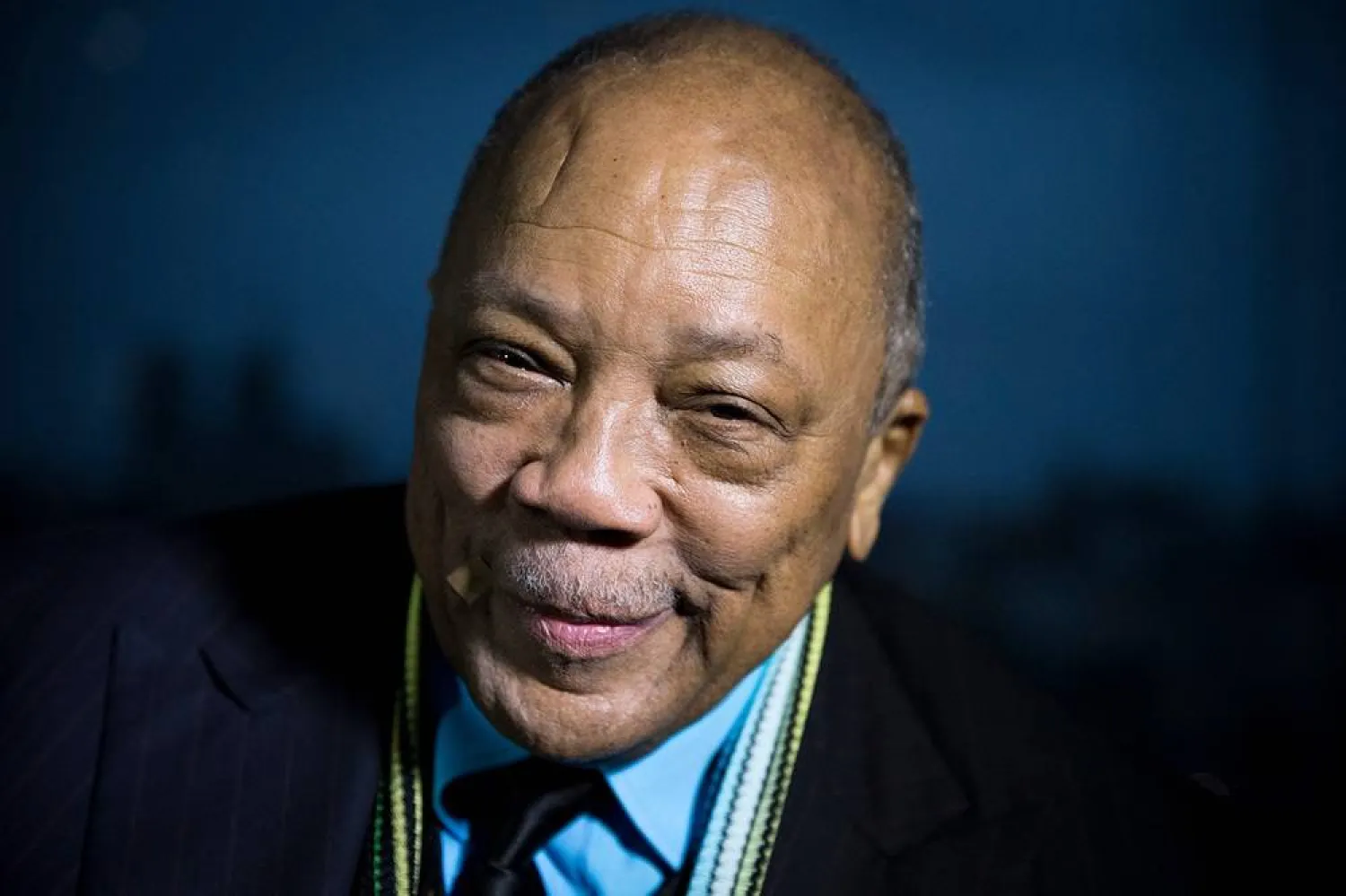 US musician and producer Quincy Jones poses after being awarded Grand Commandeur de l'Ordre des Arts et des Lettres at the Institut du Monde Arabe (Arabic World Institute) in Paris, on October 6, 2014. (AFP) 