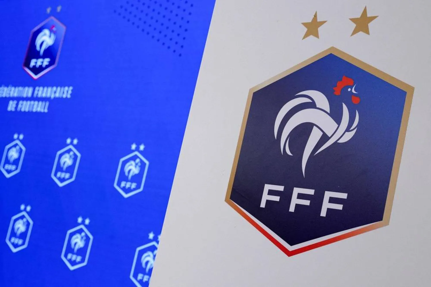 This photograph taken on June 3, 2024, shows logos of the French Football Federation (FFF) during a press conference to announce the pre-selection of the players who will take part in the upcoming training camp of France's men's Olympic football team, at the FFF headquarters in Paris. (AFP)